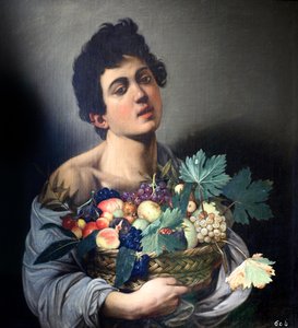 Niño con una cesta de frutas por Caravaggio